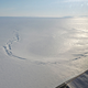 Illustration for article titled Ice Cracks Outline The Collapse Of A Drained Subglacial Lake